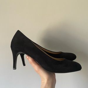 Faux suede black kitten heel pumps.